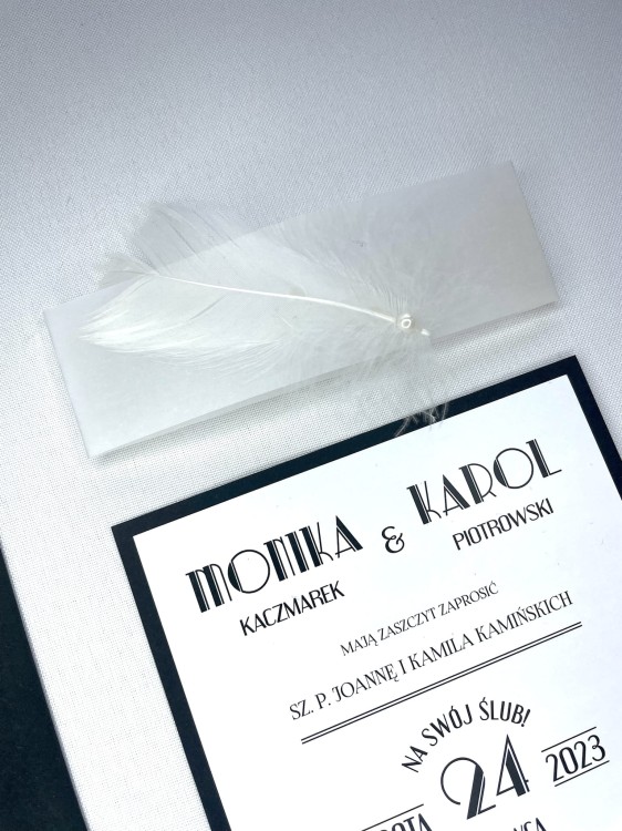 eleganckie zaproszenia z piórkiem i perełką