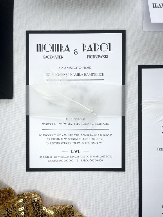 eleganckie zaproszenia z piórkiem i perełką